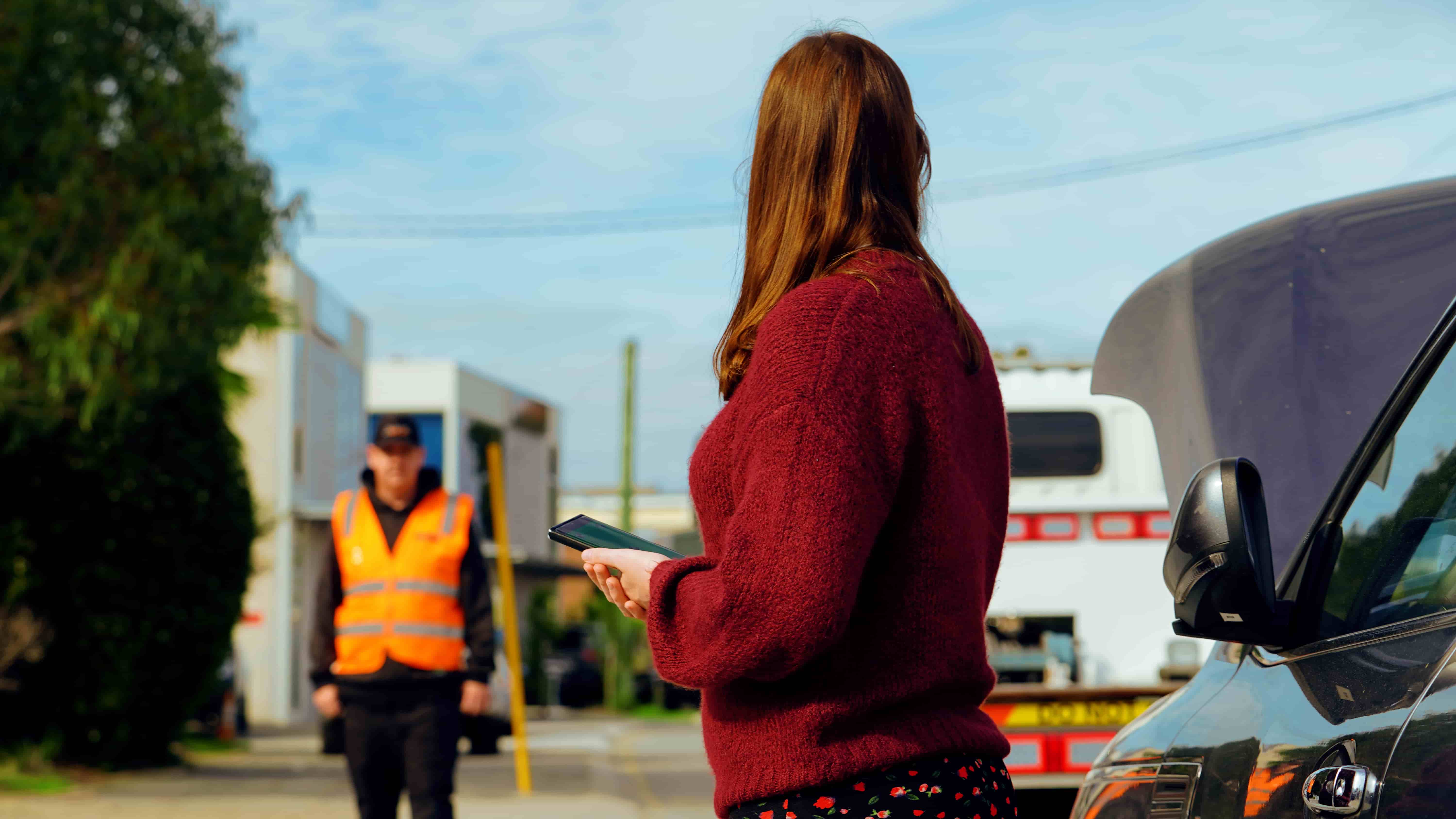 Driver looking at paperwork
